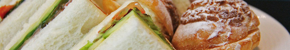 Eating Sandwich Cafe at Caffe Tazza restaurant in Chula Vista, CA.
